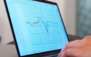 A photo of a graph on a laptop