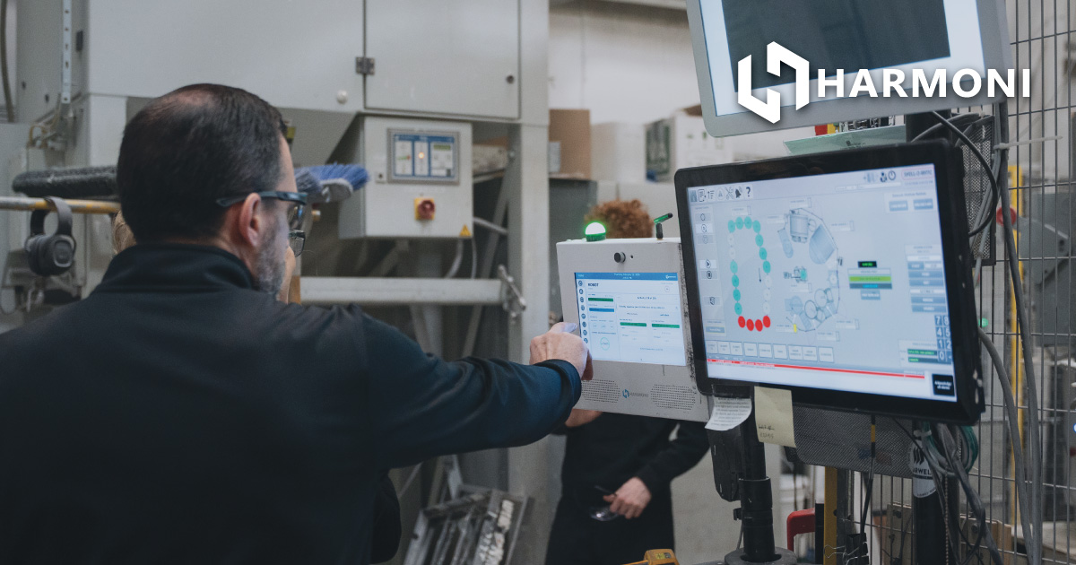 harmoni factory orchestration system being used by a machine operator